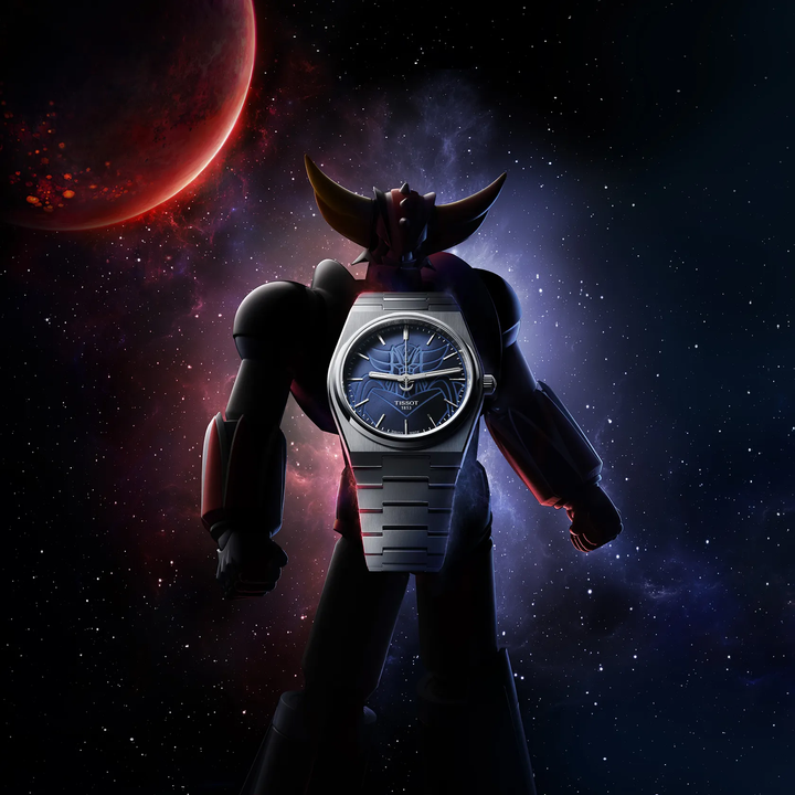 Tissot PRX UFO Robot Grendizer 40mm watch on a colored background, reference T137.407.11.041.02