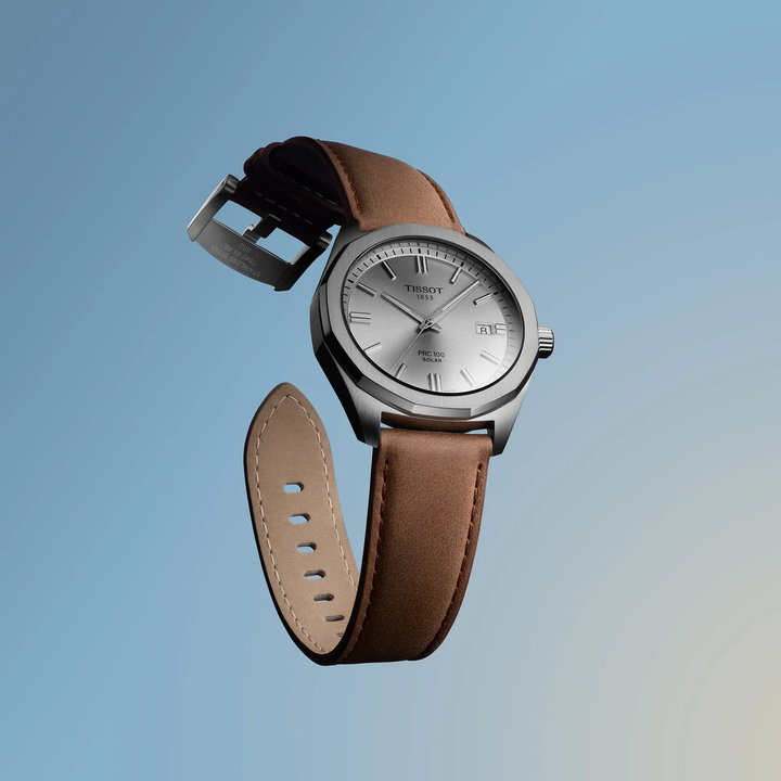 Tissot PRC 100 Solar 39mm watch on a colored background, reference T151.422.16.031.00