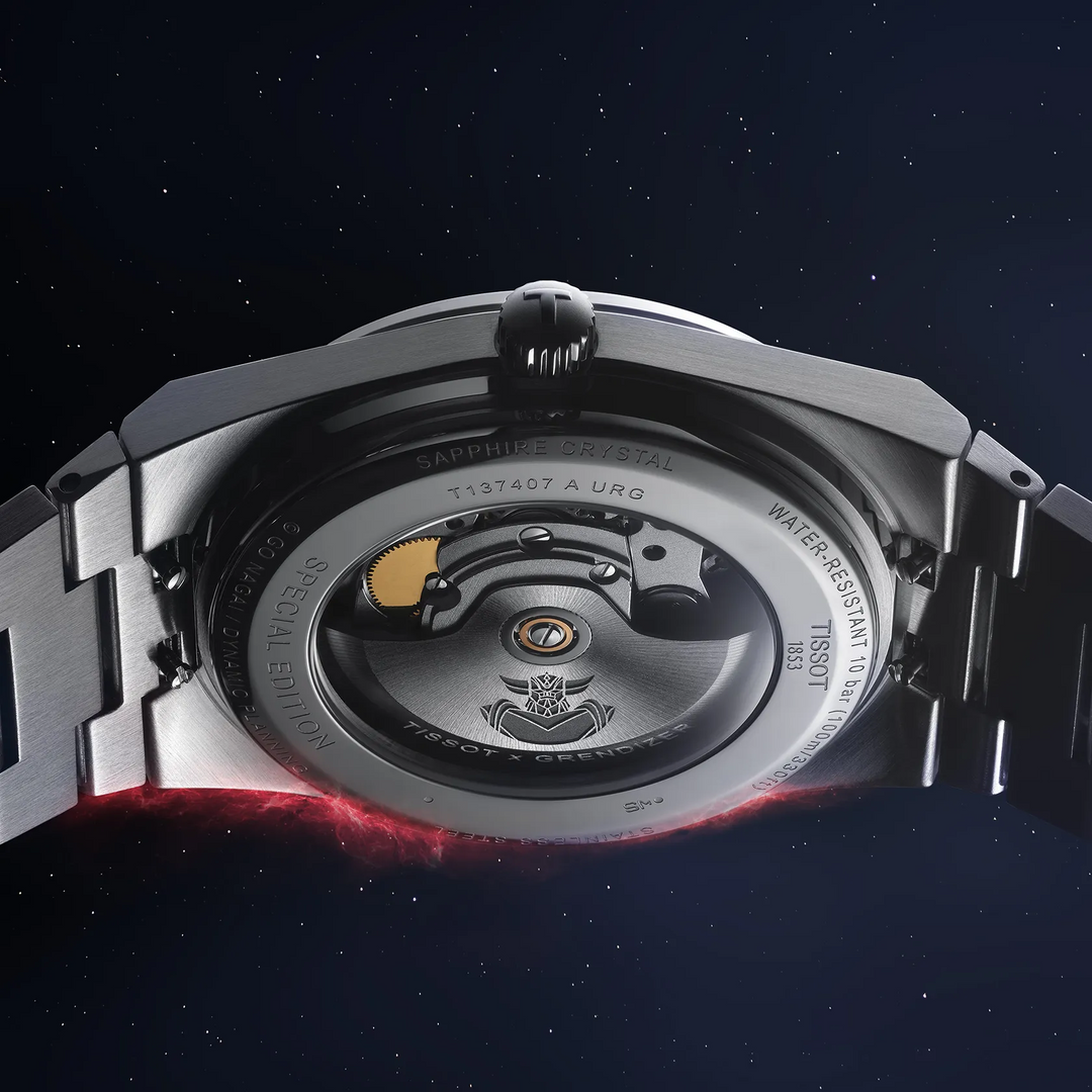 Tissot PRX UFO Robot Grendizer 40mm watch on a colored background, reference T137.407.11.041.02
