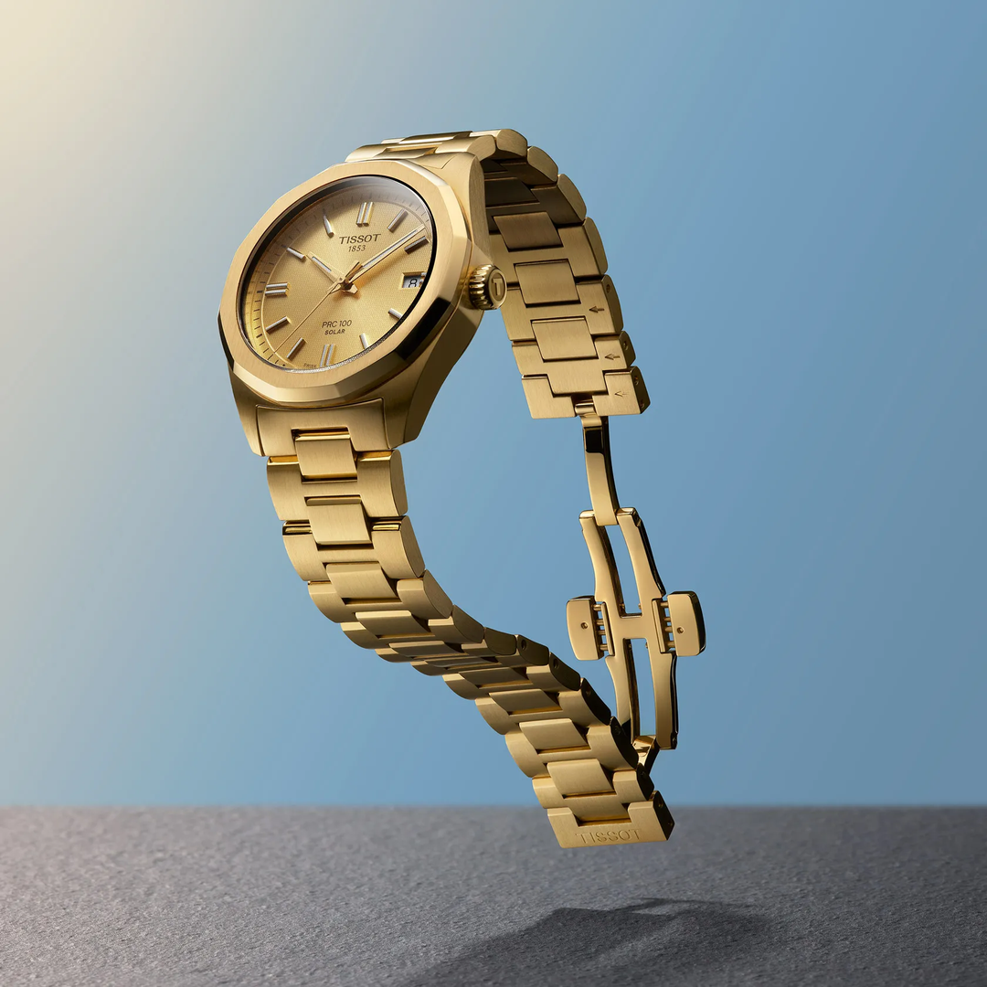 Tissot PRC 100 Solar 34mm watch on a colored background, reference T151.822.33.021.00