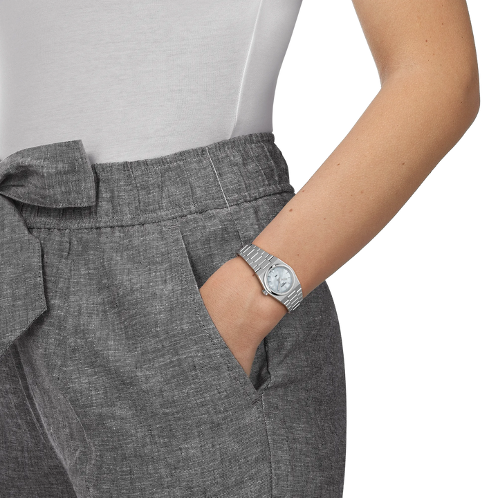 Simulation of the watch Tissot PRX 25mm on a wrist, reference T137.010.11.111.00