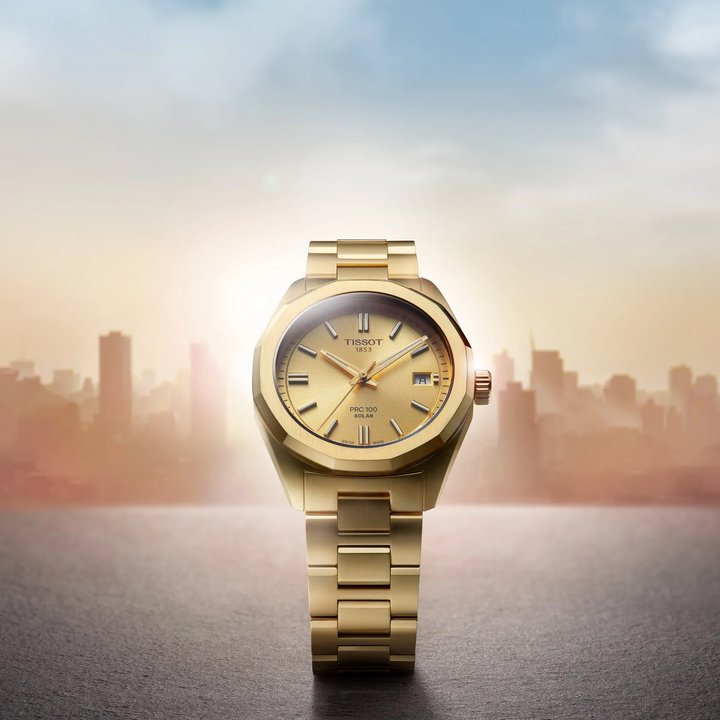 Tissot PRC 100 Solar 34mm watch on a colored background, reference T151.822.33.021.00