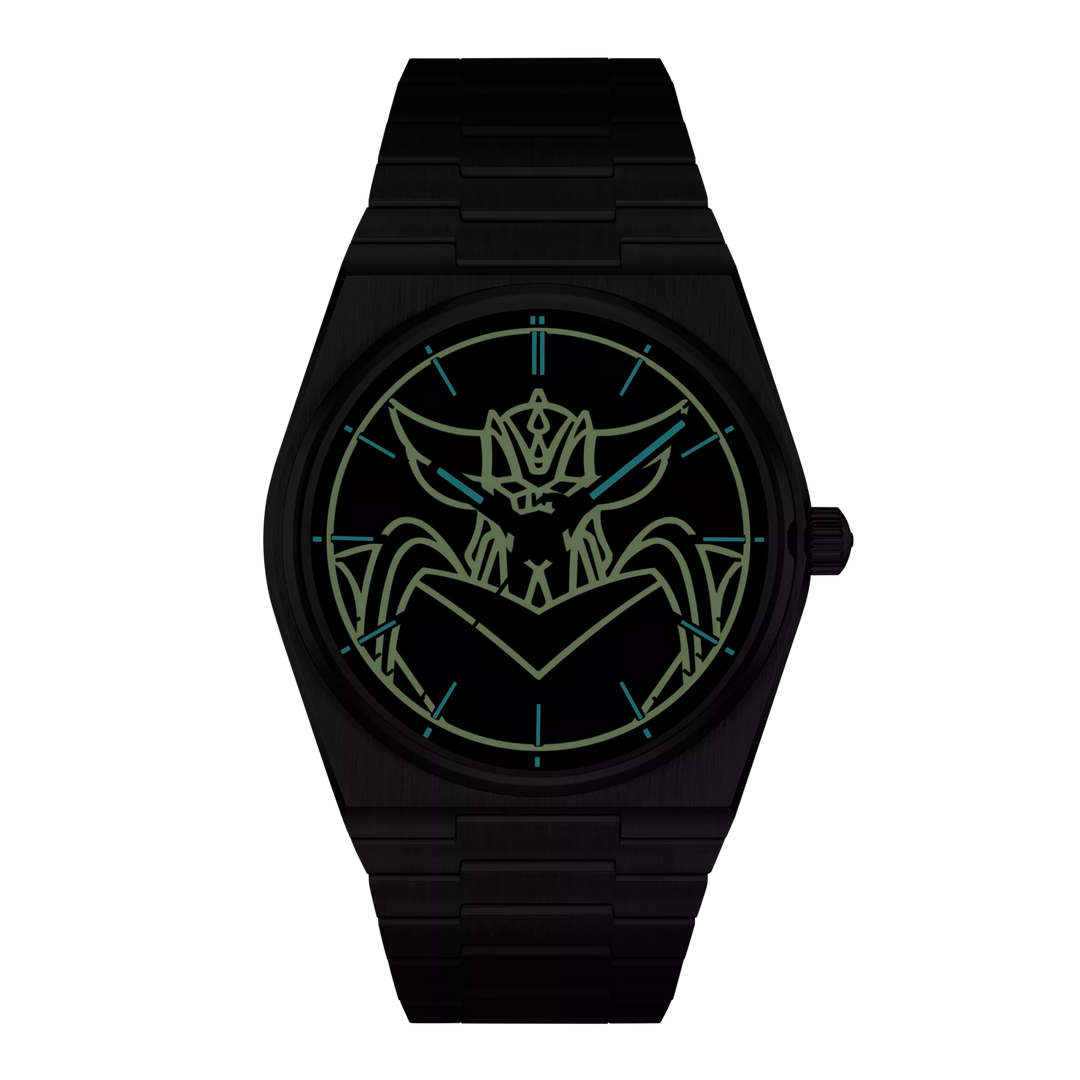 Front view of the watch Tissot PRX UFO Robot Grendizer 40mm in night mode, reference T137.407.11.041.02