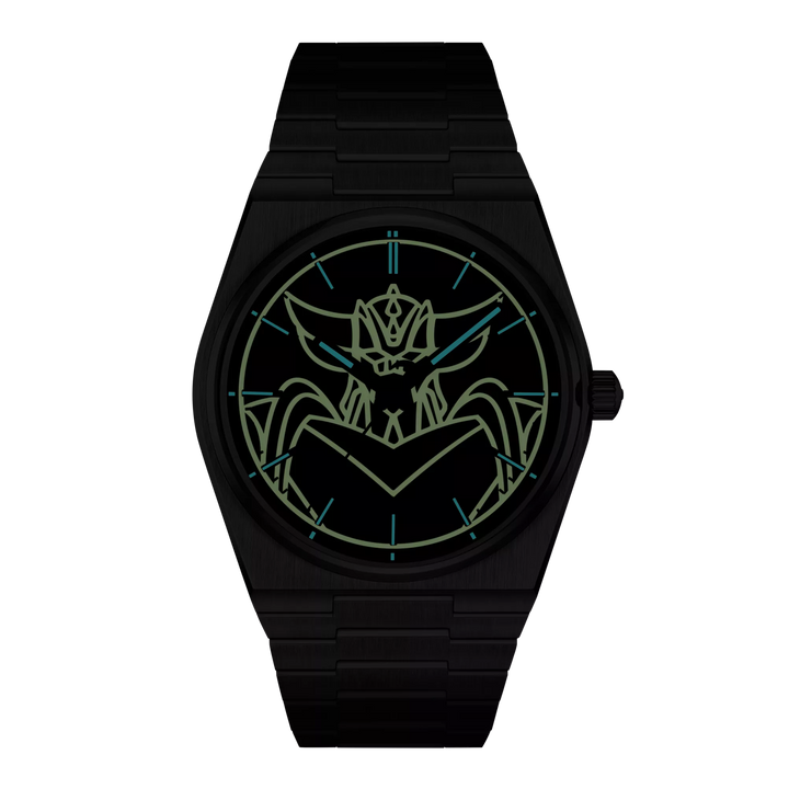 Front view of the watch Tissot PRX UFO Robot Grendizer 40mm in night mode, reference T137.407.11.041.02
