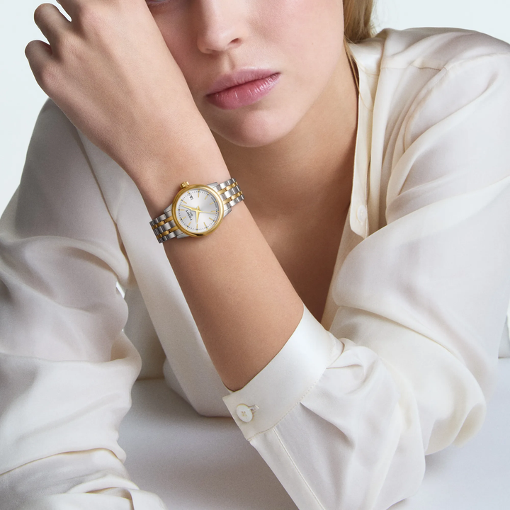 Simulation of the watch Tissot Classic Dream 28mm on a wrist, reference T129.210.22.031.00