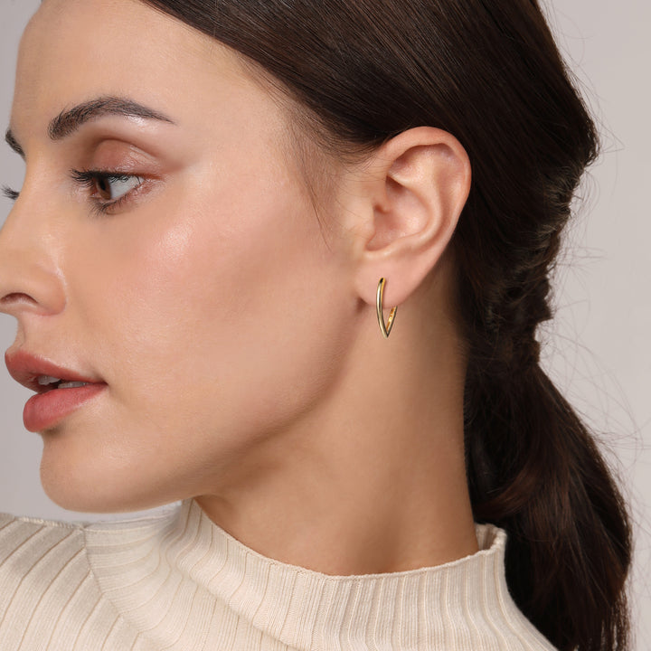 Gabriel & Co. 14K Yellow Gold Classic Hoop Earrings — shown on a model; other jewellery sold separately — EG15169Y4JJJ