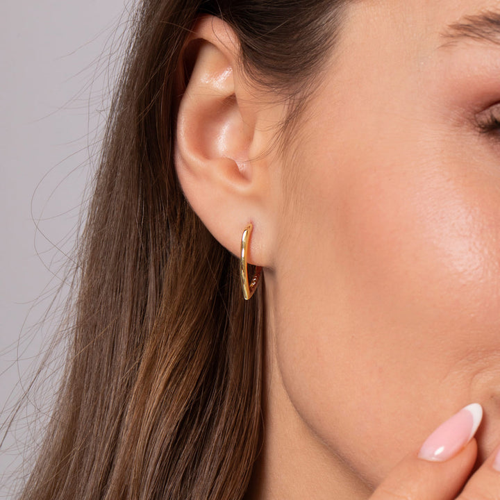 Gabriel & Co. 14K Yellow Gold Classic Hoop Earrings — shown on a model; other jewellery sold separately — EG15169Y4JJJ