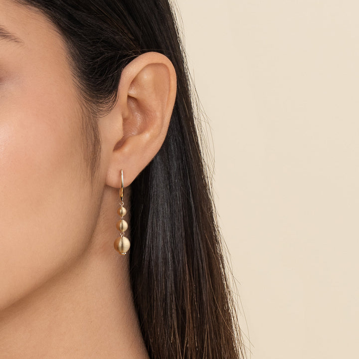 Gabriel & Co. 14K Yellow Gold Graduating Bujukan Beads Leverback Drop Earrings — shown on a model; other jewellery sold separately — EG15663Y4JJJ