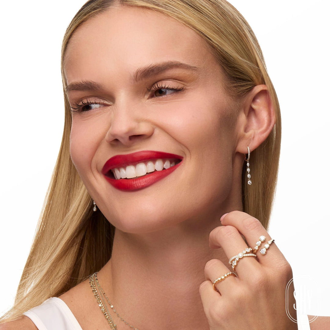 Shy Creation 0.71 ct Diamond Bezel "X" Ring in 14K Yellow Gold — styled with other jewellery; additional pieces sold separately — SC55029740