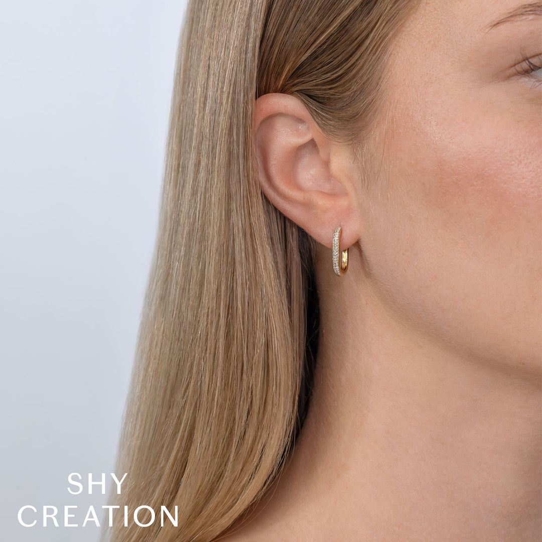 Shy Creation 14K Yellow Gold 0.18 TCW Diamond Oval Hoop Earrings SC55023239H0.65