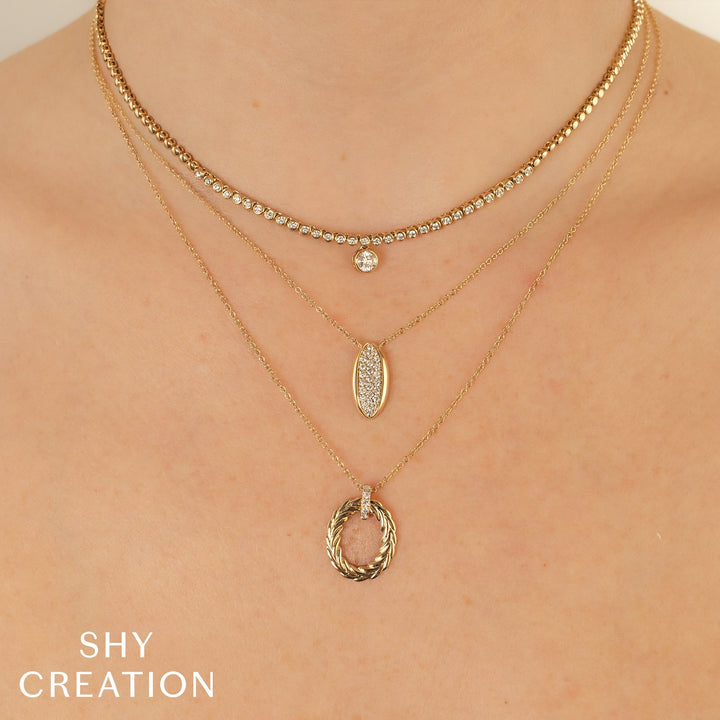Shy Creation 0.07 ct Diamond Laurel Wreath Oval Necklace in 14K Yellow Gold — styled with other jewellery; additional pieces sold separately — SC55026565