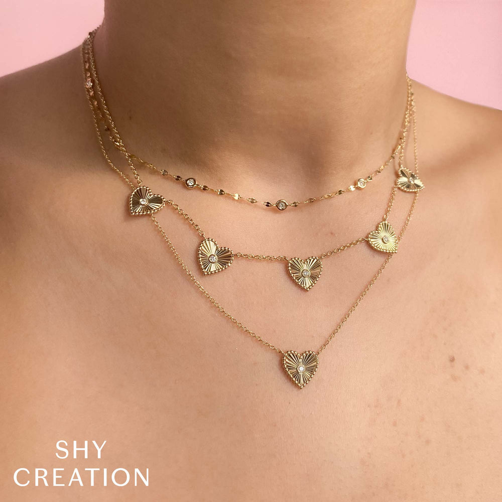 Shy Creation 0.20 ct 18" Bezel-Set Diamond Station Sparkle Necklace in 14K Yellow Gold — SC55025783 — styled with other jewellery; additional pieces sold separately