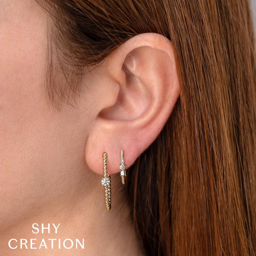 Shy Creation 0.28Ct 14K Yellow Gold Diamond Baguette Oval Hoop Earring SC55028599H0.60