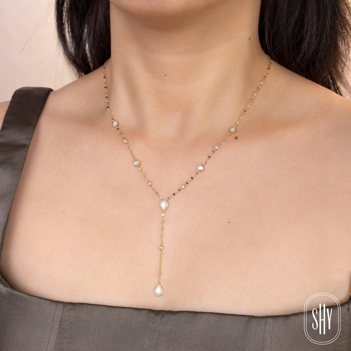 Shy Creation 0.07 ct Diamond & Mother of Pearl Pear Bezel Lariat Sparkle Chain Necklace in 14K Yellow Gold — styled with other jewellery; additional pieces sold separately — SC55029664