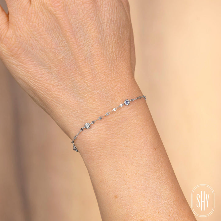 Shy Creation 0.04 ct Diamond & Blue Sapphire 7" Bezel-Set Diamond Station Sparkle Chain Bracelet in 14K White Gold — styled with other jewellery; additional pieces sold separately — SC55029850