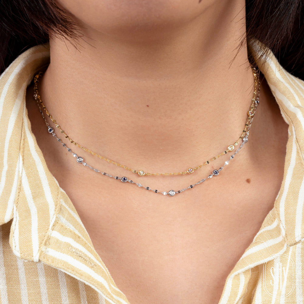 Shy Creation 0.09 ct Diamond & Pink Sapphire 18" Bezel-Set Diamond Station Sparkle Necklace in 14K Yellow Gold — styled with other jewellery; additional pieces sold separately — SC55029866