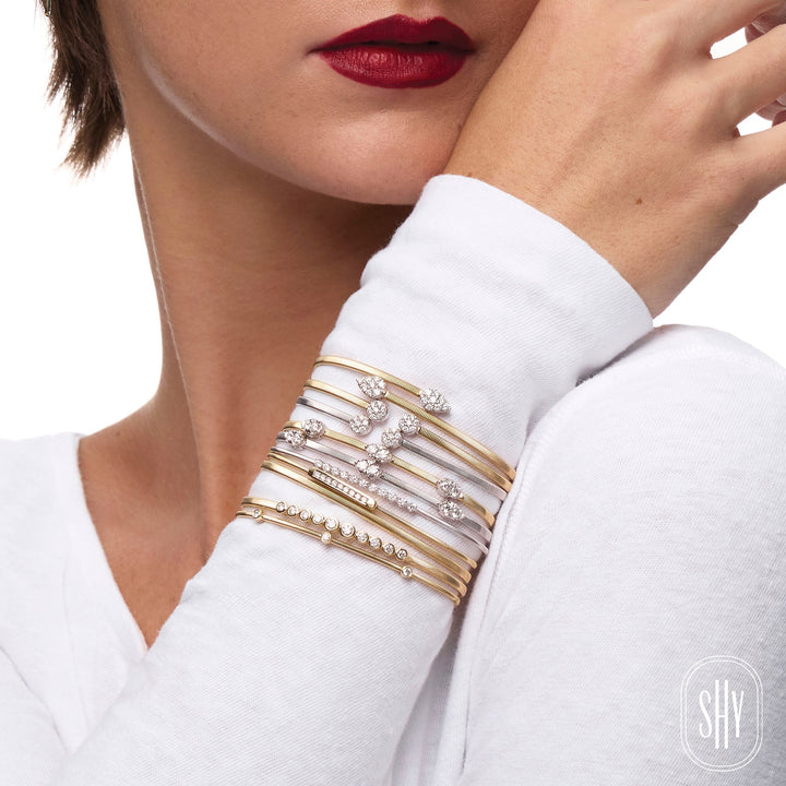 Shy Creation 2.5mm Bangle in 14K Yellow Gold — styled with other jewellery; additional pieces sold separately — B22001133GOV2ZS