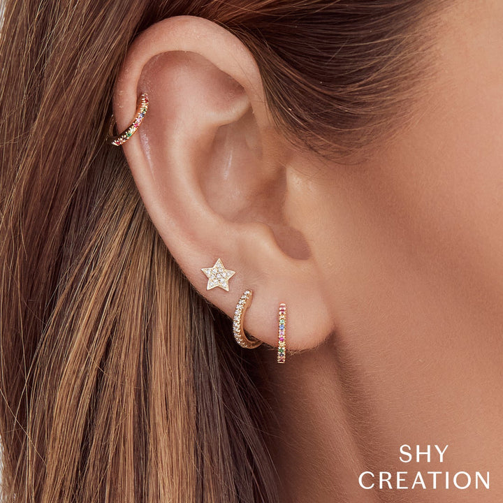 Shy Creation 0.07 ct Diamond Huggie Earrings in 14K Yellow Gold — styled with other jewellery; additional pieces sold separately — SC22004026