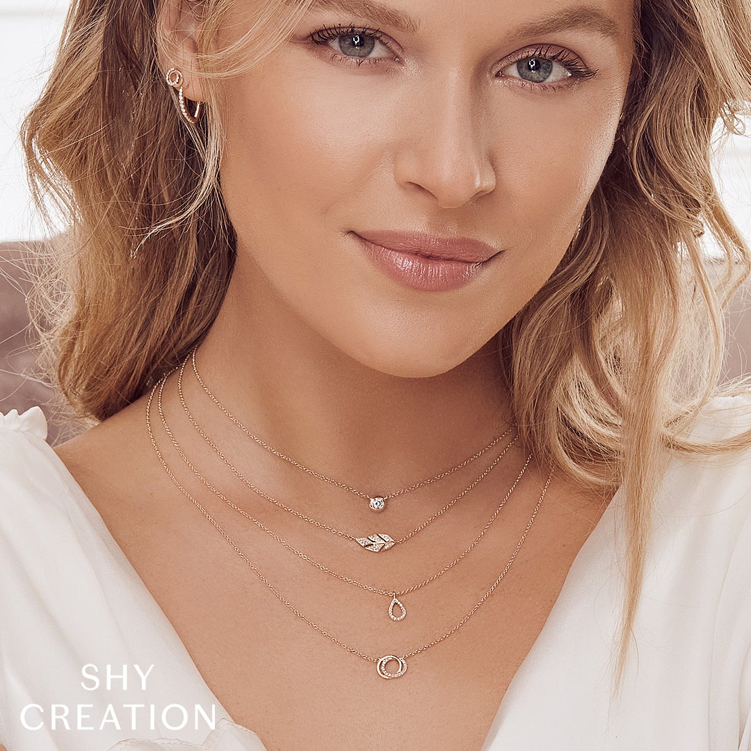 Shy Creation 0.07 ct Diamond Love Knot Circle Necklace in 14K Yellow Gold — styled with other jewellery; additional pieces sold separately — SC55009638