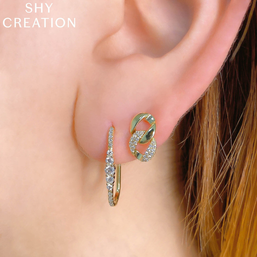Shy Creation 0.29 ct Diamond Oval Hoop Earrings in 14K Yellow Gold — styled with other jewellery; additional pieces sold separately — SC55022231H0.80