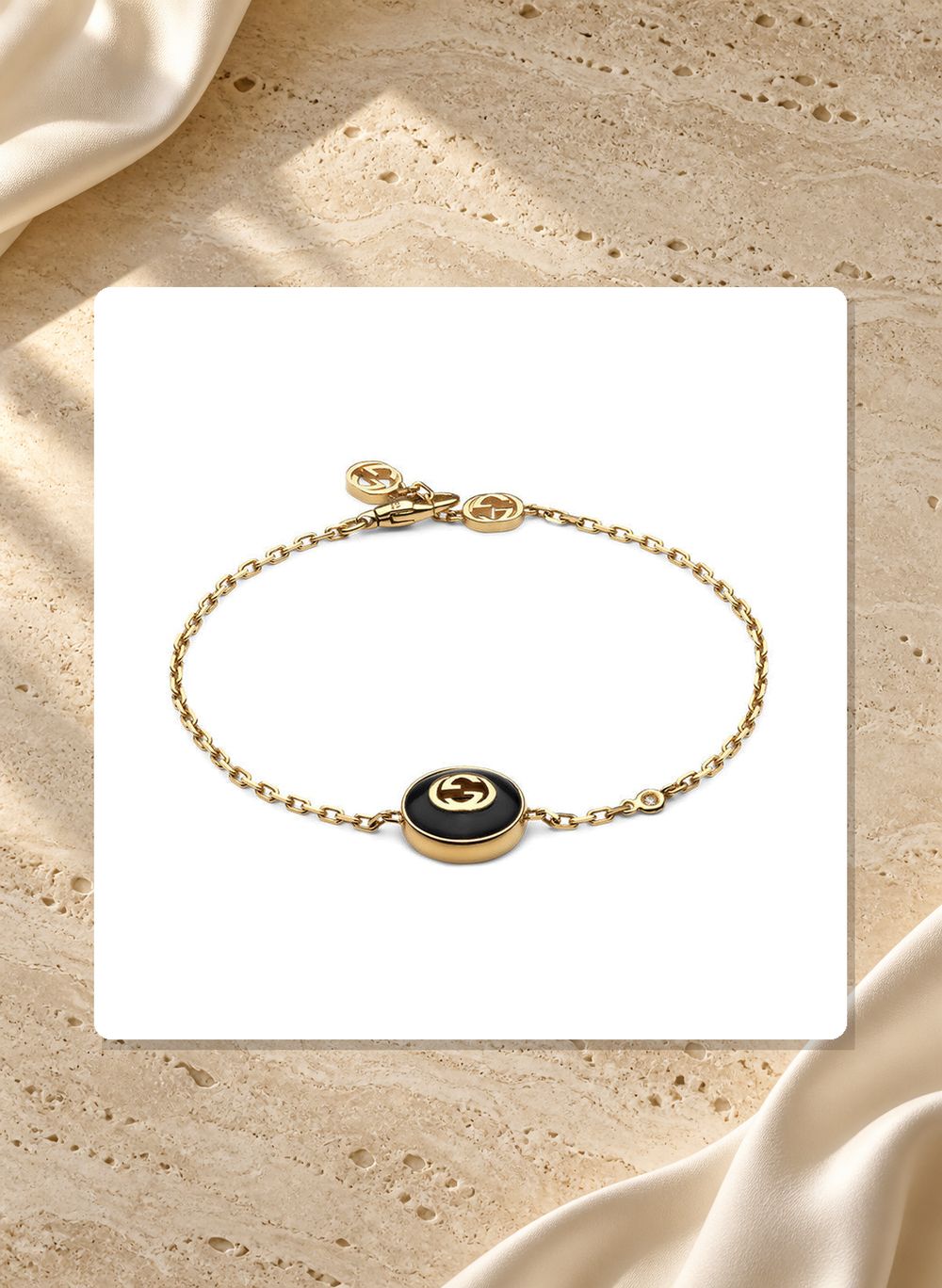 Gucci Interlocking G 18K Yellow Gold Chain Bracelet With Onyx YBA786556001017 lifestyle view