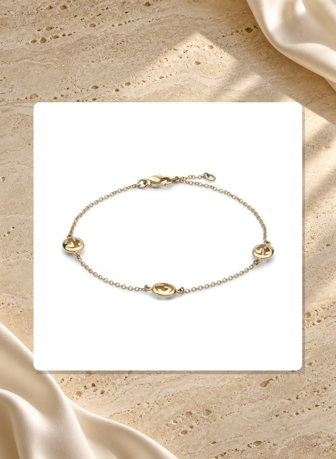 Gucci Interlocking G 18K Yellow Gold Three-Station Bracelet 17 cm YBA874214001017 lifestyle view