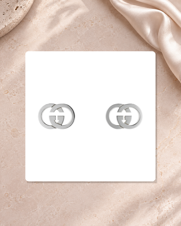 Gucci Interlocking G Sterling Silver Stud Earrings YBD81495700100U lifestyle view