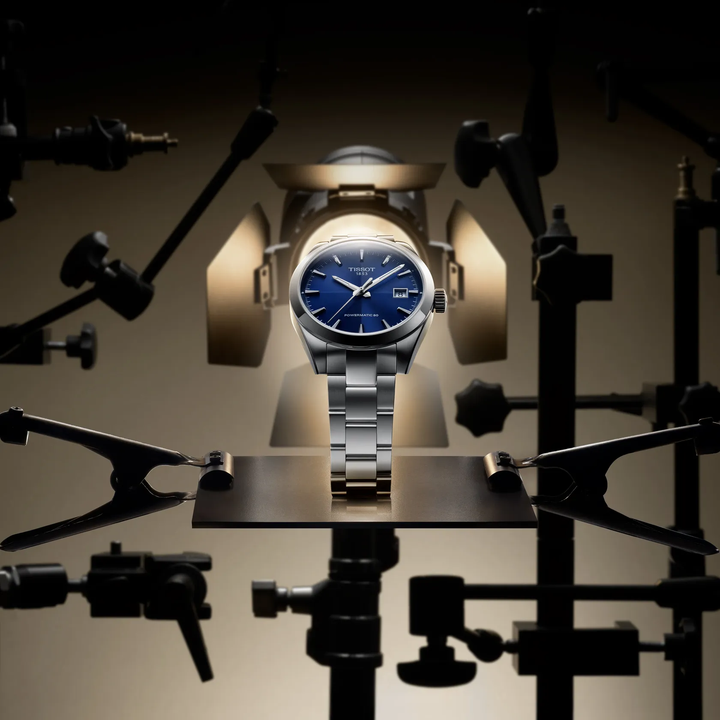 Tissot Gentleman 38mm watch on a colored background, reference T165.807.11.041.00