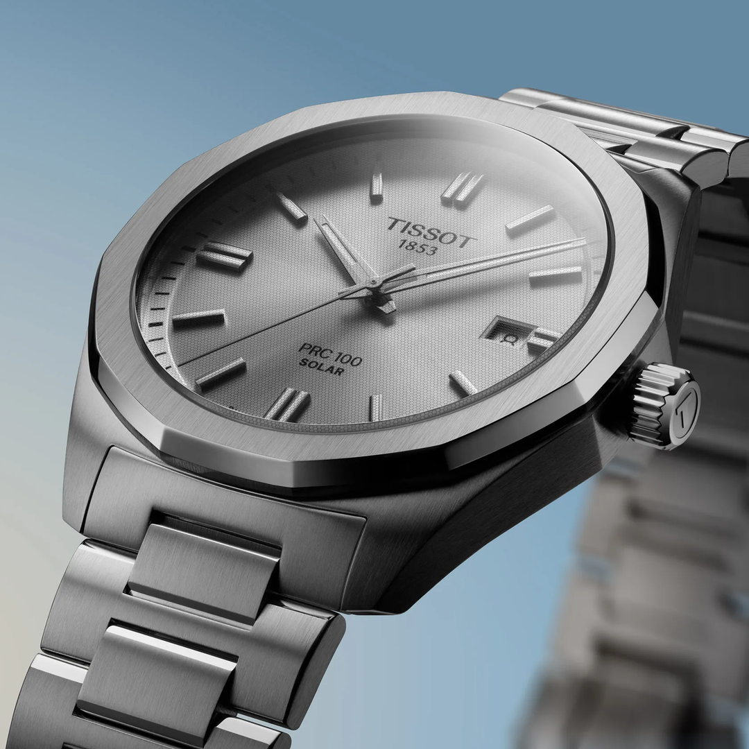Tissot PRC 100 Solar 39mm watch on a colored background, reference T151.422.11.031.00