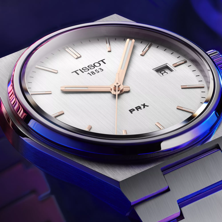 Tissot PRX 40mm watch on a colored background, reference T137.410.11.031.00