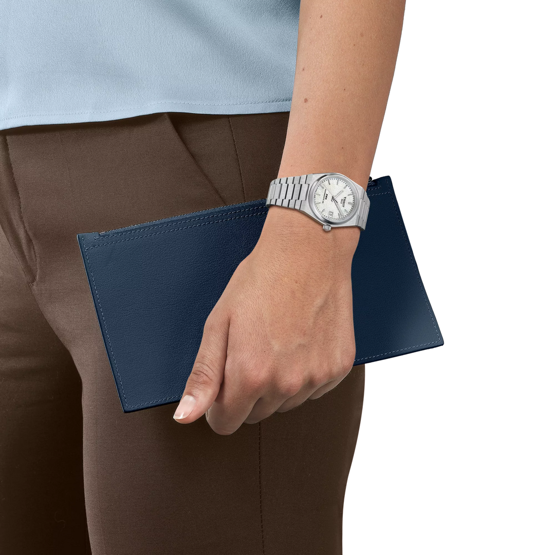 Simulation of the watch Tissot PRX 35mm on a wrist, reference T137.207.11.111.00