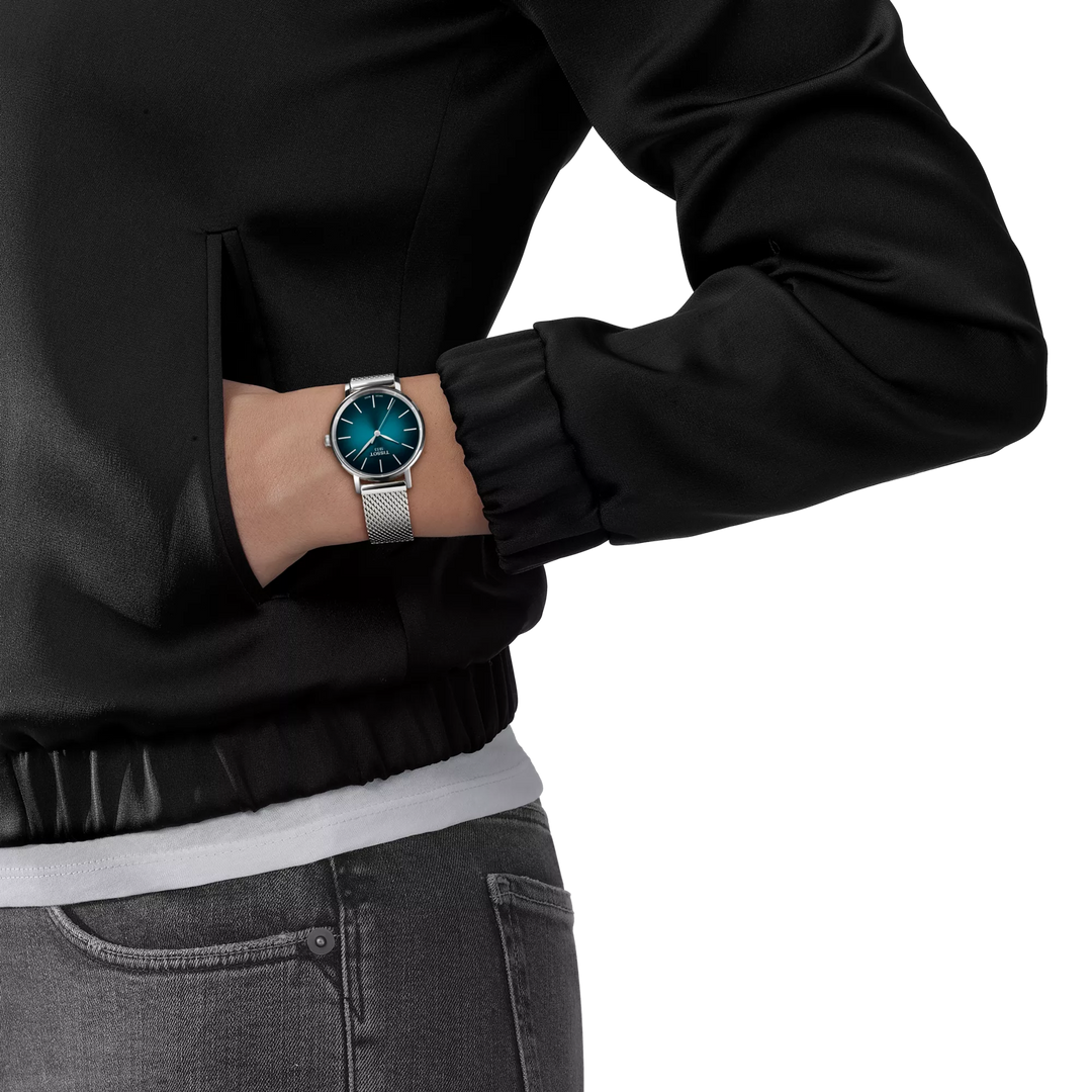 Simulation of the watch Tissot Everytime 34mm on a wrist, reference T143.210.11.091.00