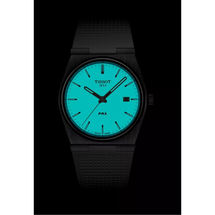 Front view of the watch Tissot PRX 40mm in night mode, reference T137.410.17.011.00