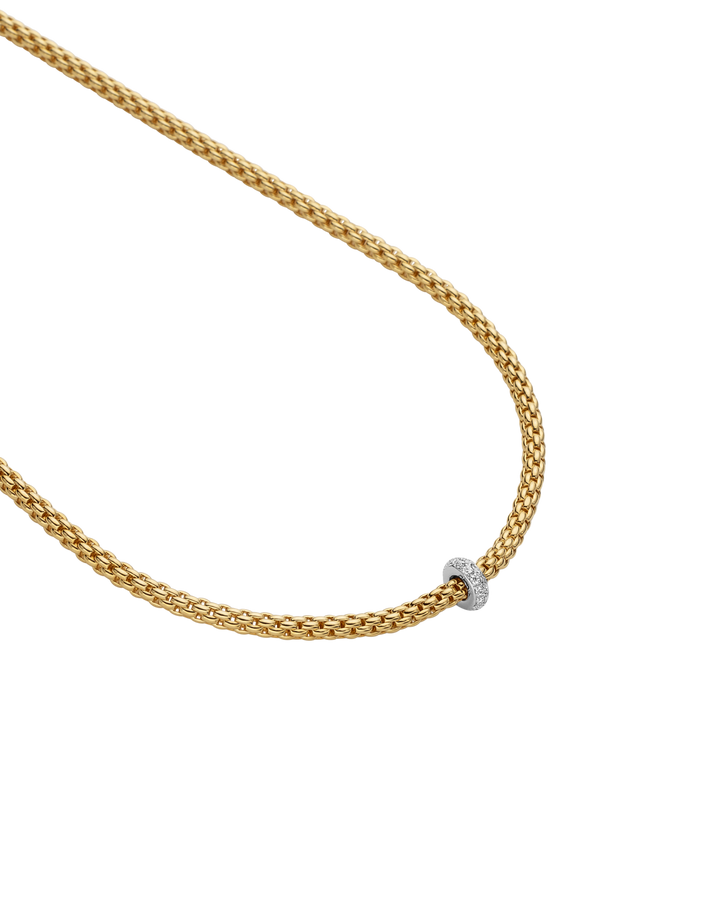 FOPE Prima 43 cm necklace in 18K yellow and white gold — angled detail of diamond rondel and chain — 74508CX_BB_G_XBX_043