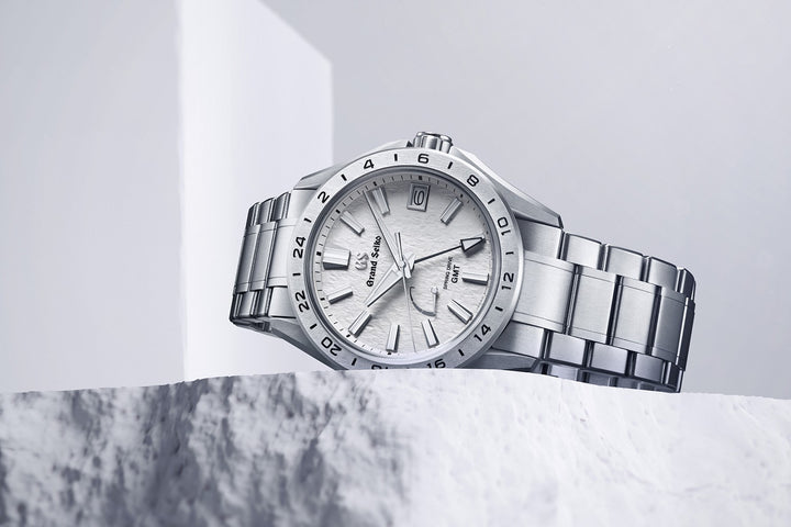 Grand Seiko SBGE285 official lifestyle product image on stone