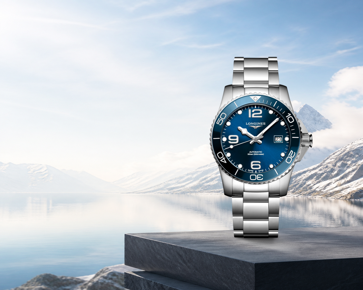 Longines HydroConquest watch against a bright Swiss alpine landscape