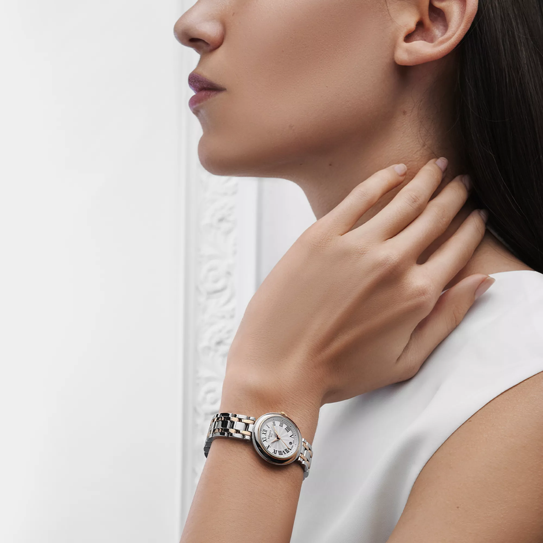 Tissot Bellissima 26mm watch on a colored background, reference T126.010.22.013.01