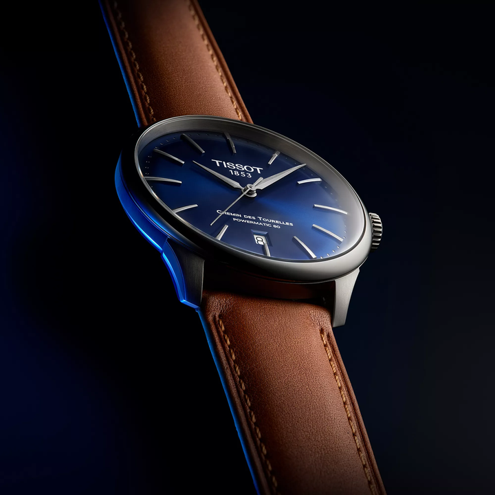 Tissot Chemin des Tourelles 42mm watch on a colored background, reference T139.407.16.041.00